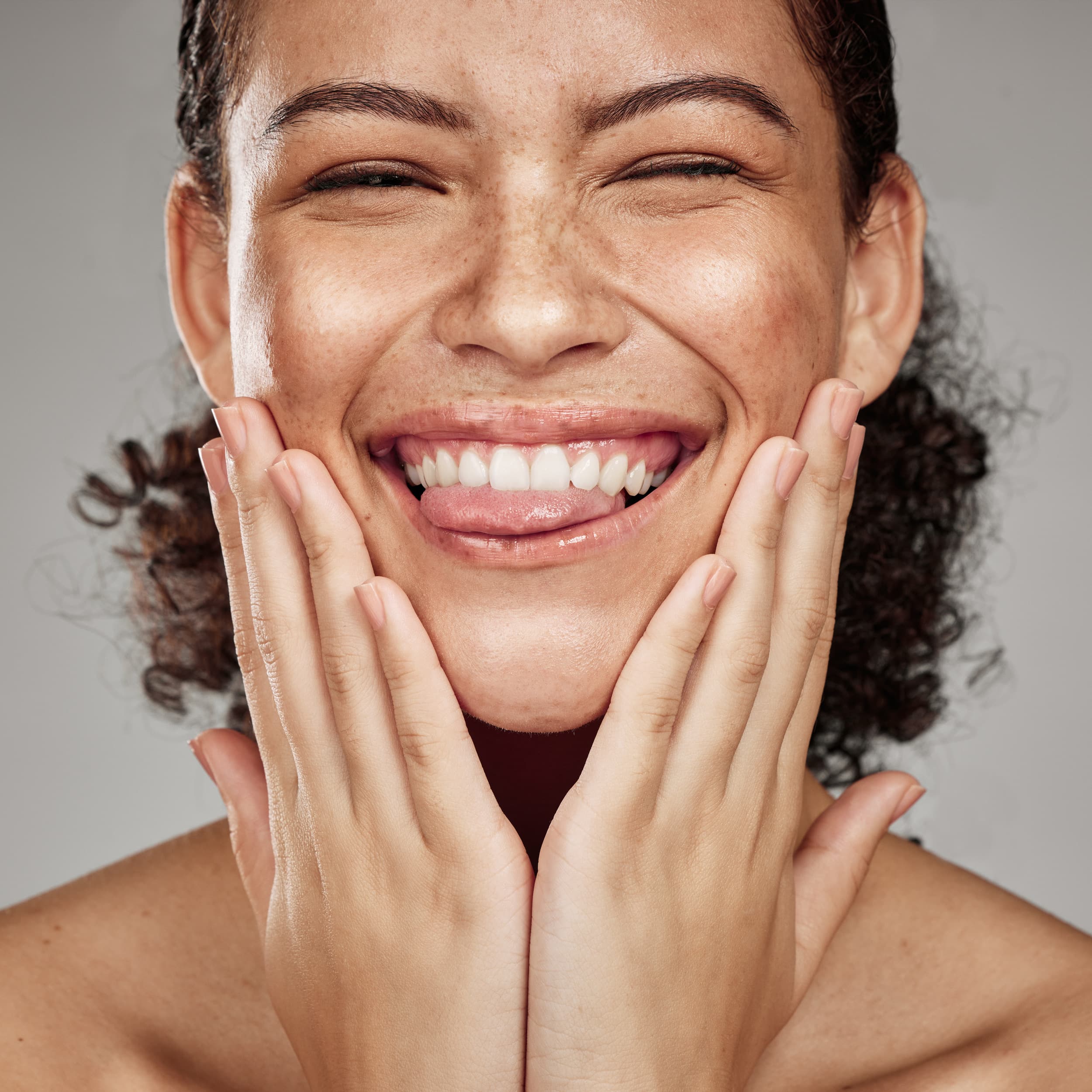 Smiling woman with glowing skin